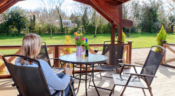 the lodge's sundeck looks out on to countryside